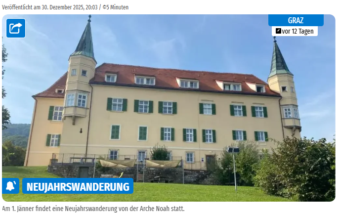 Historisches Gebäude mit zwei Türmen, umgeben von Grün und blauem Himmel.